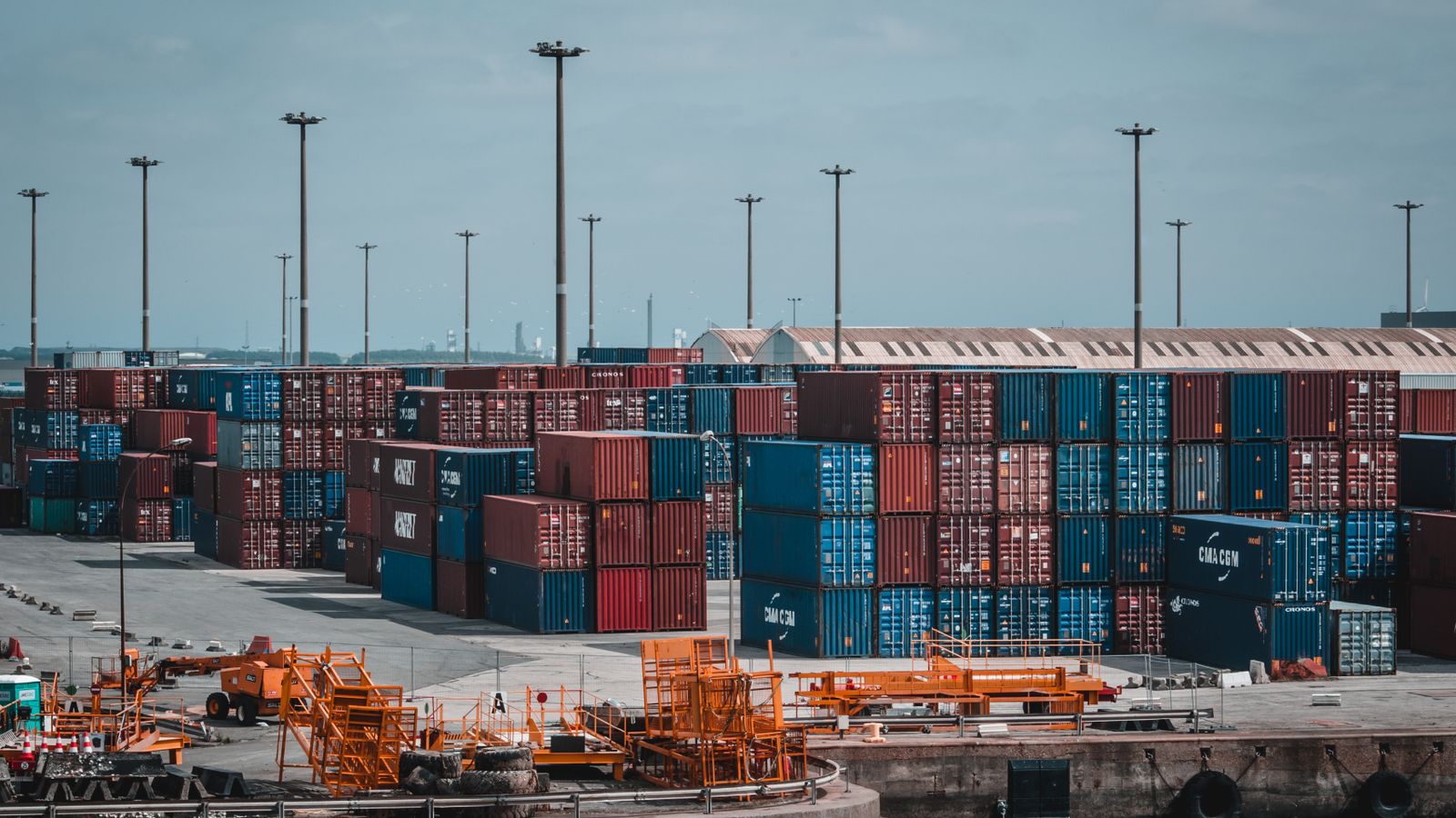 Container yard team checking a magnetic asset deployment