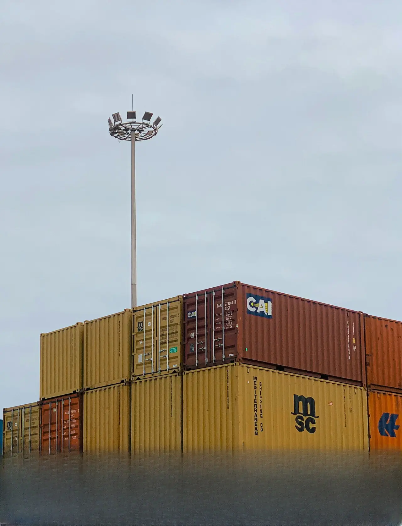 Stacked shipping containers at a port